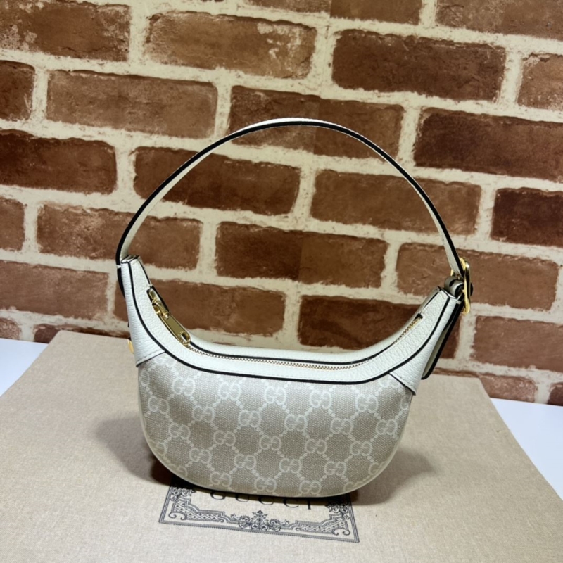 G*u*i top handle bags